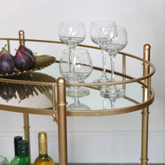 Golden Glamour Oval Drinks Trolley With Mirrored Elegance